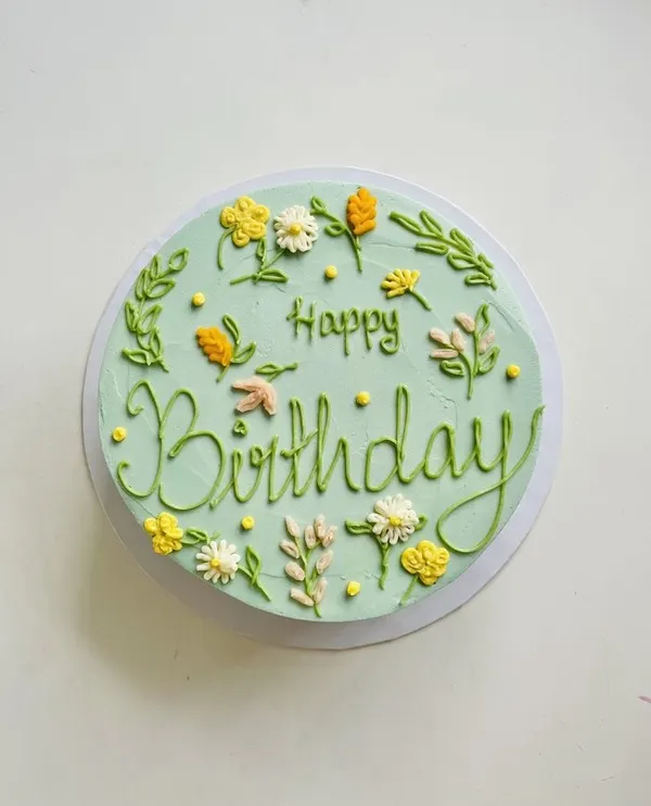 A Fig & Owl buttercream cake