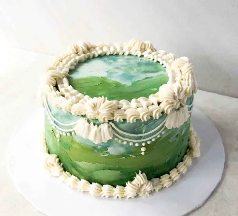 Colette, a hand-painted Fig & Owl cake